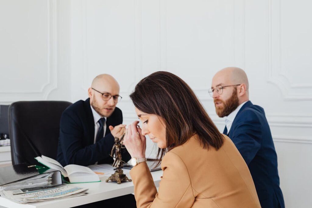 Sad Woman Sitting Next to the Bearded Man