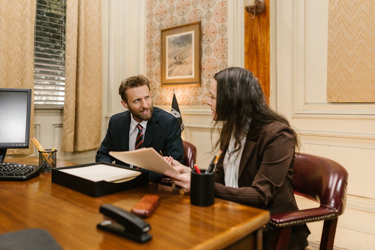 Man and Woman Having Discussion Together