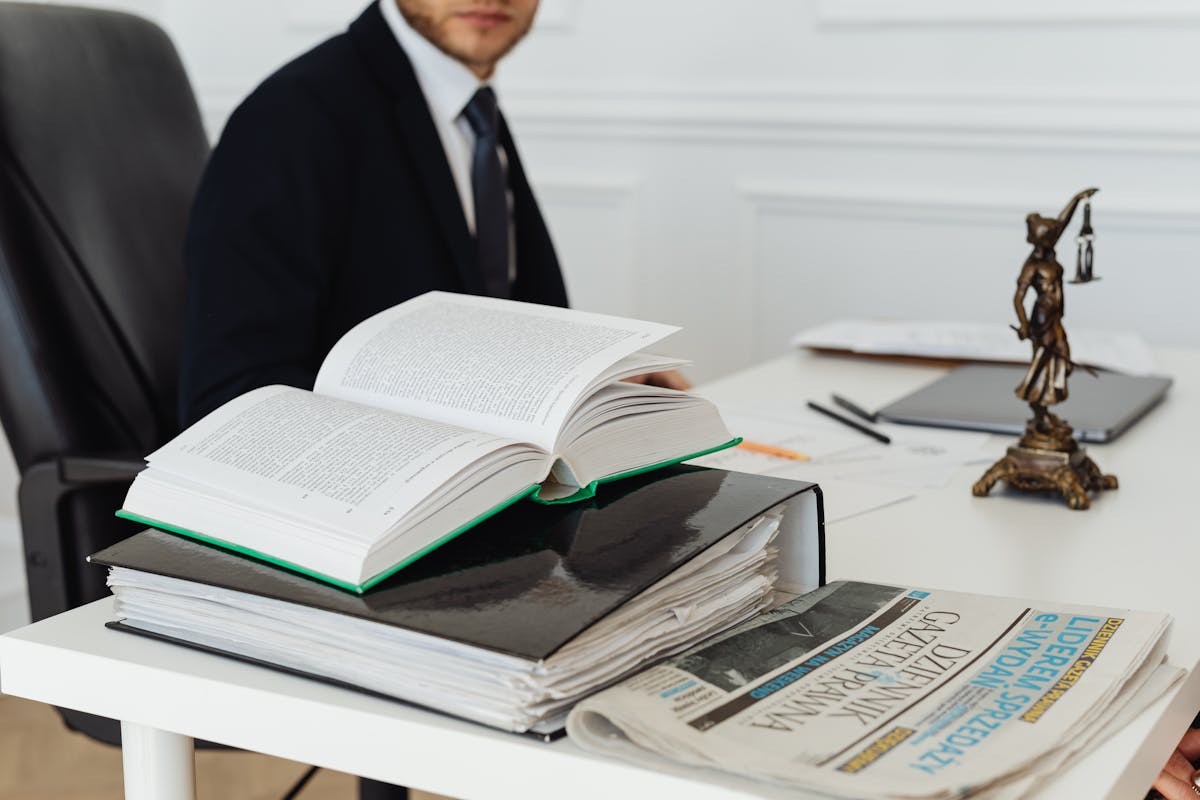 Book and Binder on a Desk